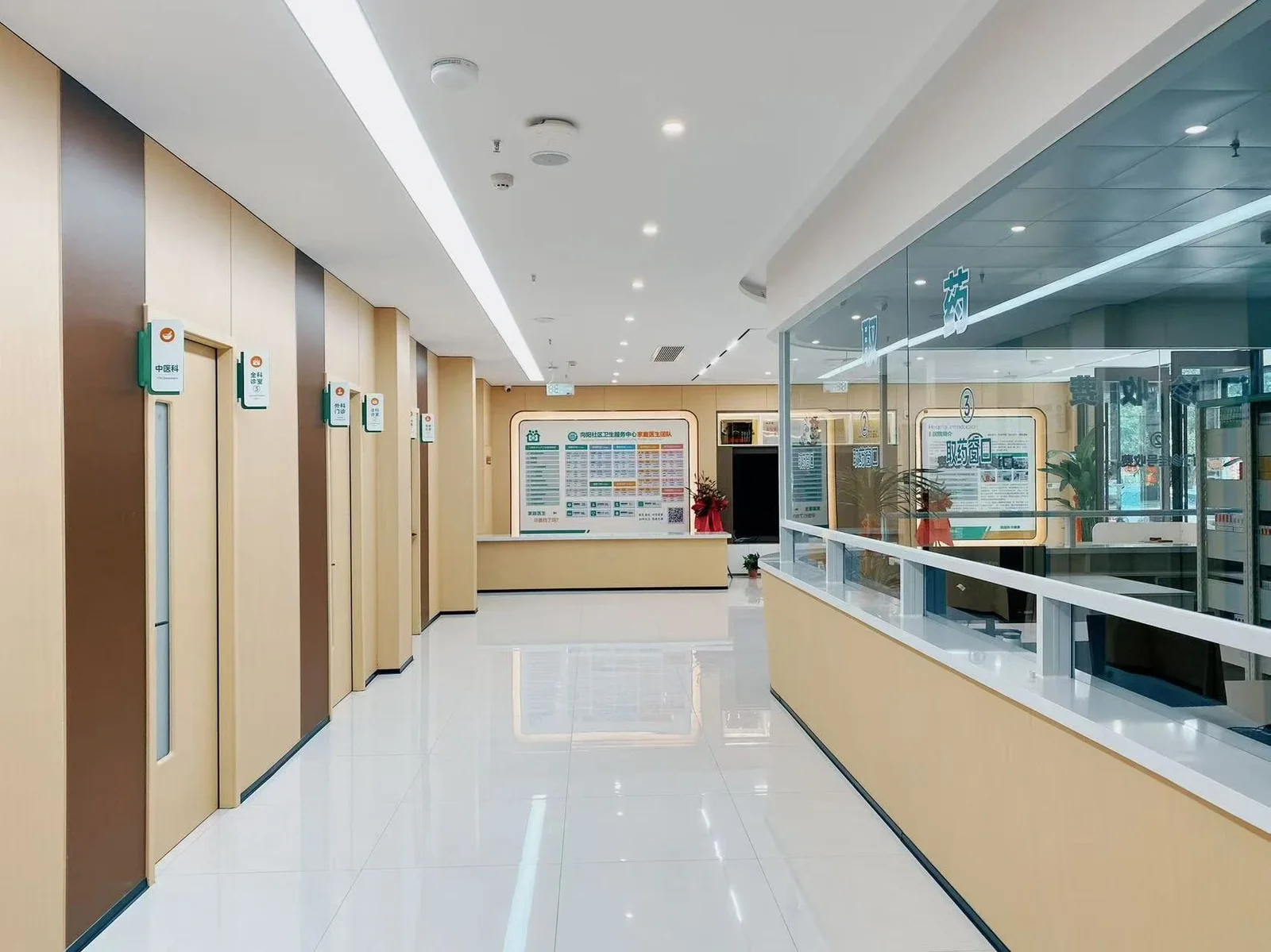 Healthcare centre corridor with integrated wall panels and matched doors